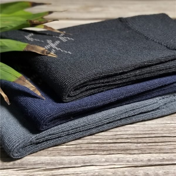 3 pairs of crew socks folded with leaves