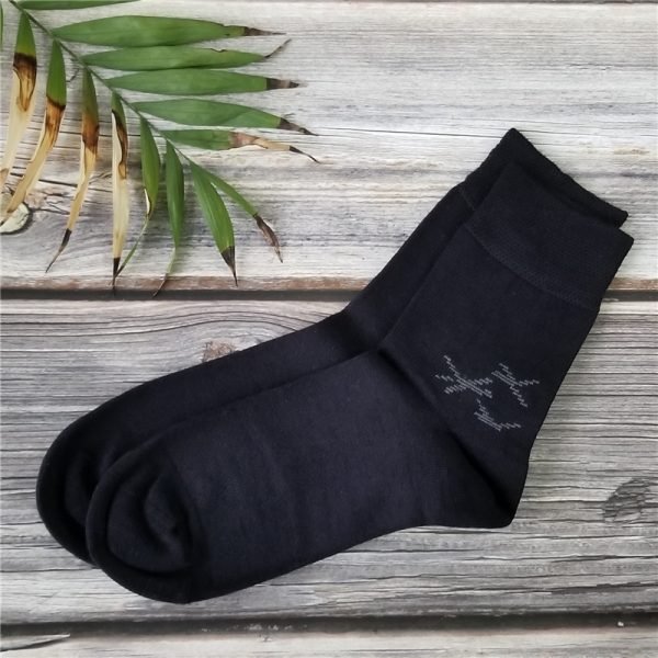 1 pair of black crew socks with leaves