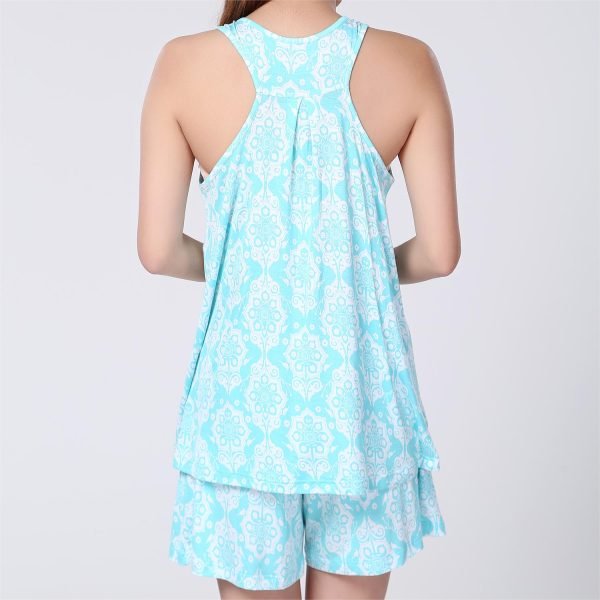 back side of girl in printed pajama short set