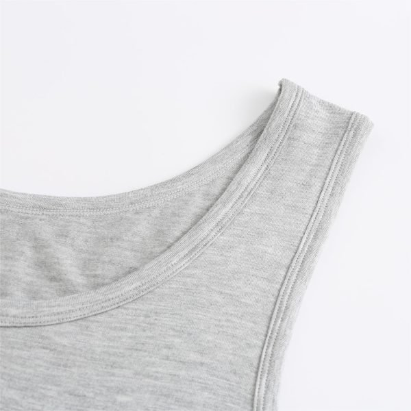 shoulder of grey tank