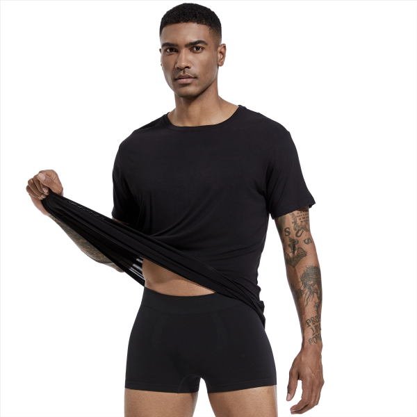 a man in black boxer and black T-shirt