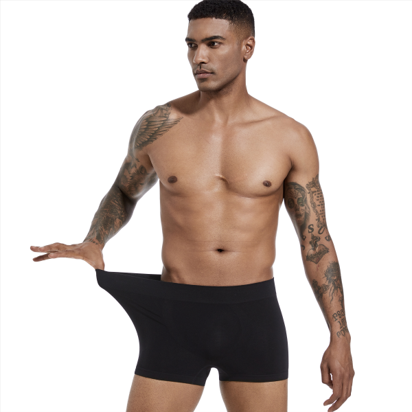 a man in black boxer